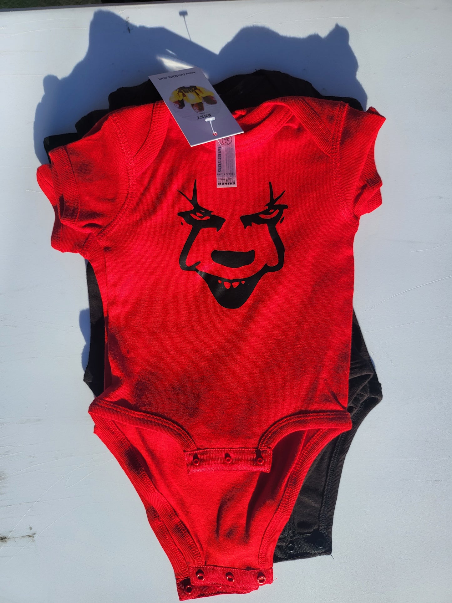 Pennywise Image on red onesie